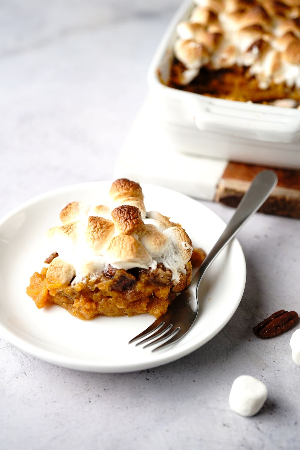 Old fashioned sweet potato casserole topped with marshmallows