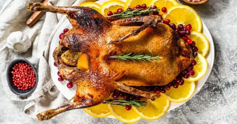 Roasted duckling garnished with orange slices