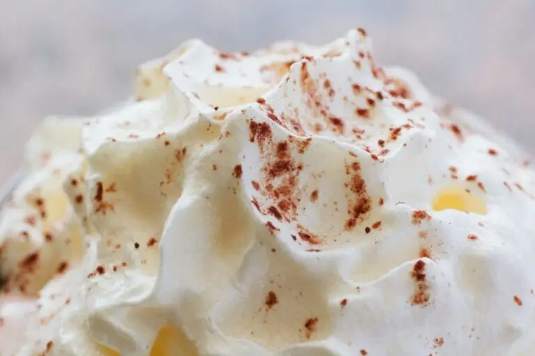 Brandied spiced whipped cream topped with cocoa dust