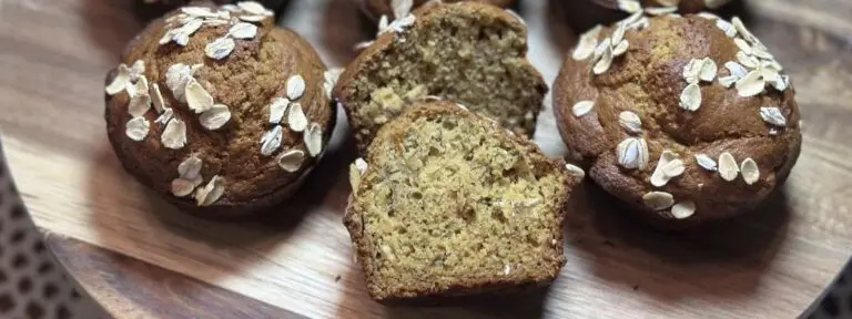 Gluten-free banana oat muffins topped with oats