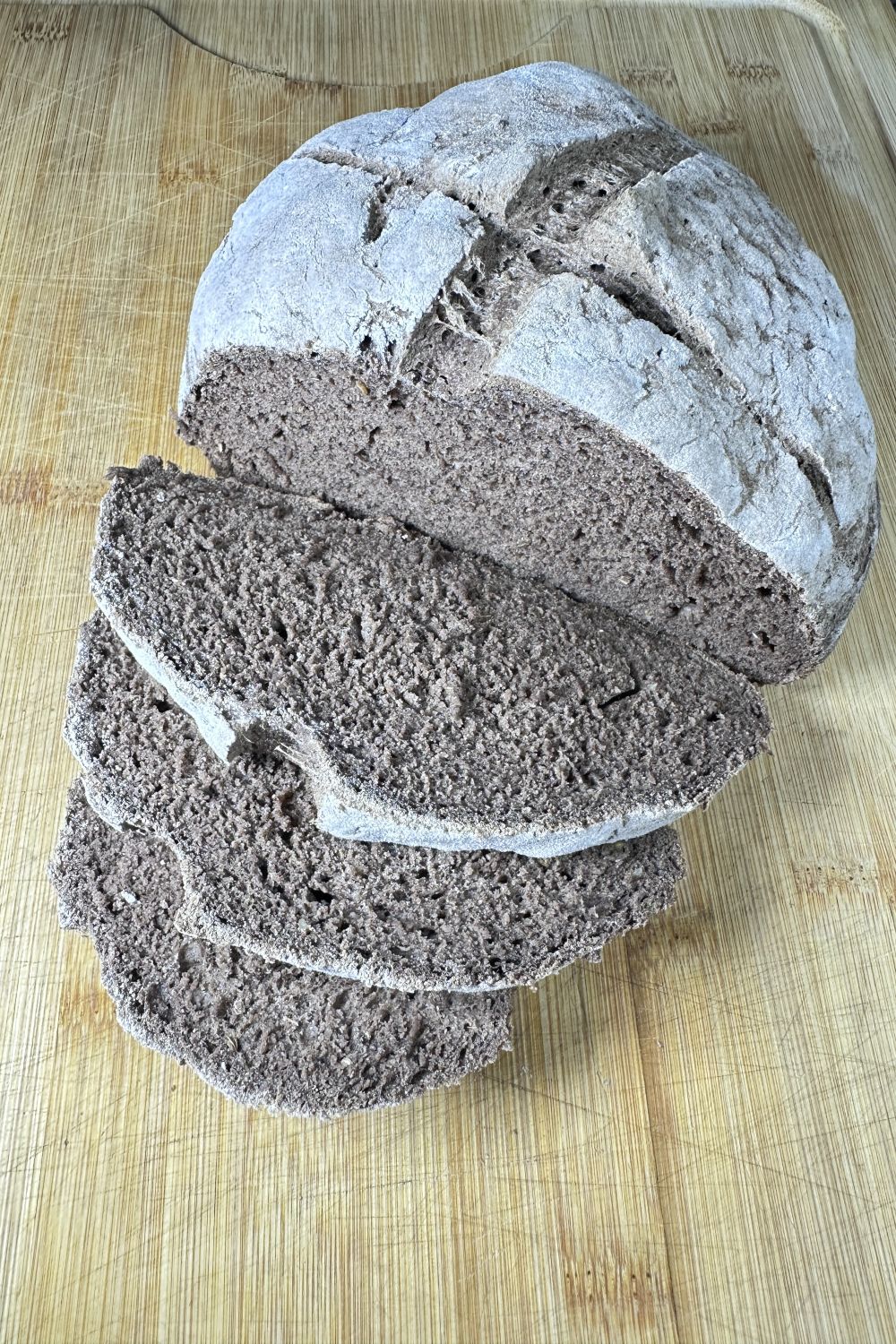 Sliced loaf of gluten free German Bauernbrot bread