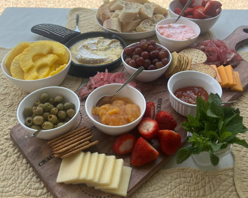 Charcuterie board featuring salami cream cheese appetizer