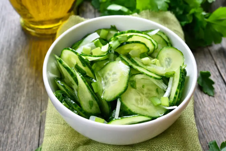 viennese cucumber salad in a small white bowl