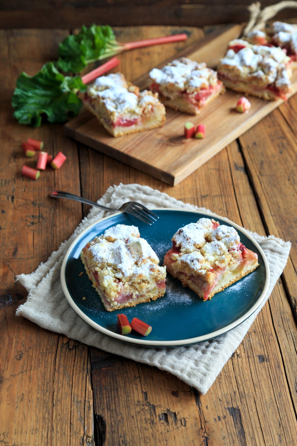 Old fashioned rhubarb cake with powdered sugar topping