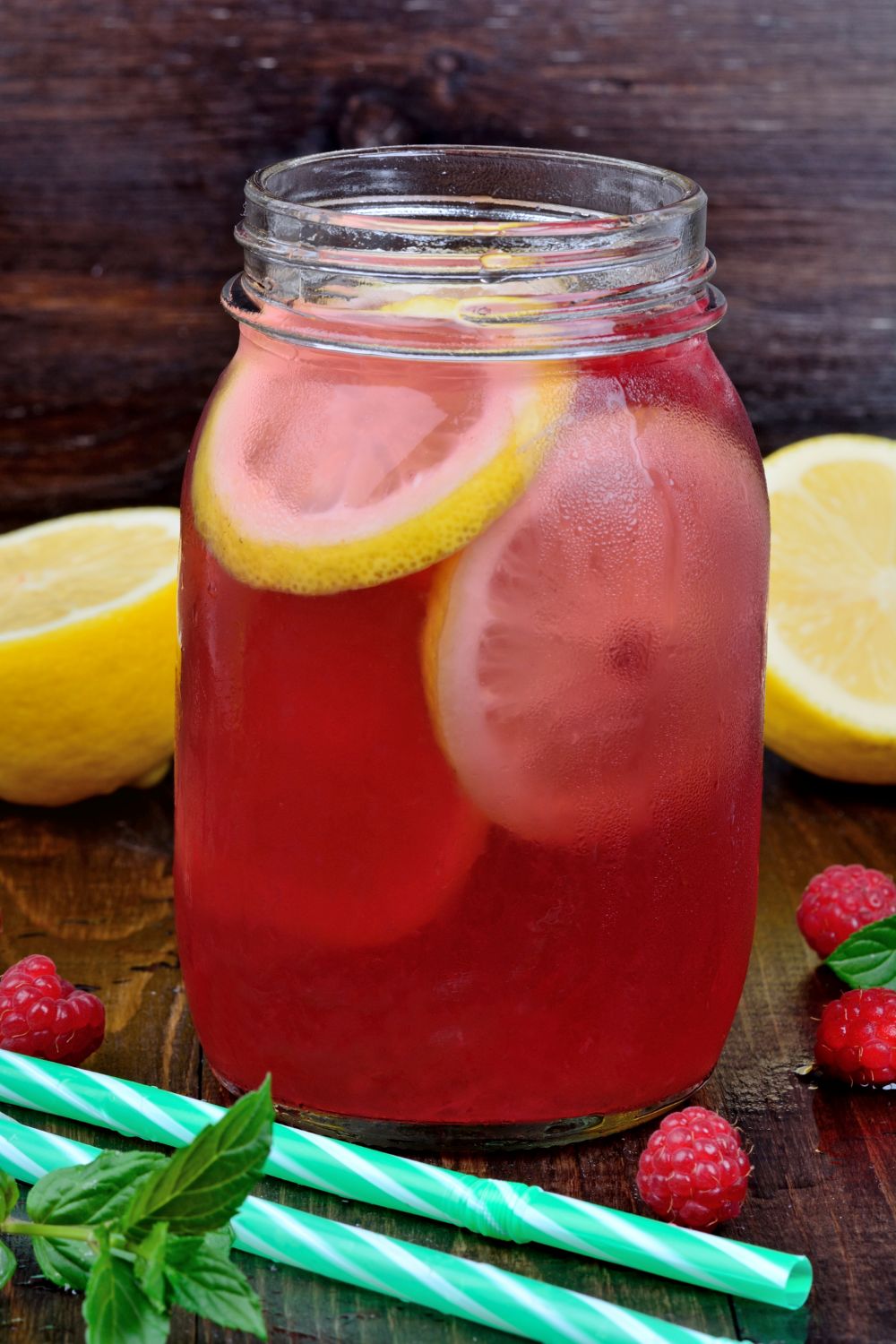 Vintage Circus Stand Pink Lemonade Vintage Circus Pink lemonade in a glasses jar on wooden table