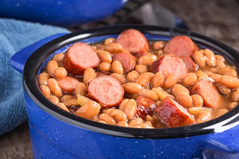 classic franks and beans casserole in blue ceramic bowl