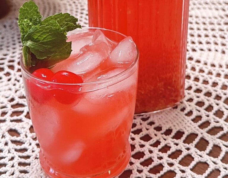 Homemade vintage circus pink lemonade garnished with mint.