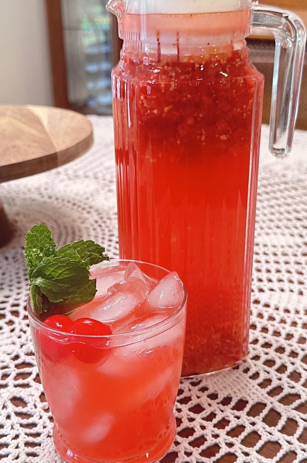 Homemade vintage circus pink lemonade garnished with mint.