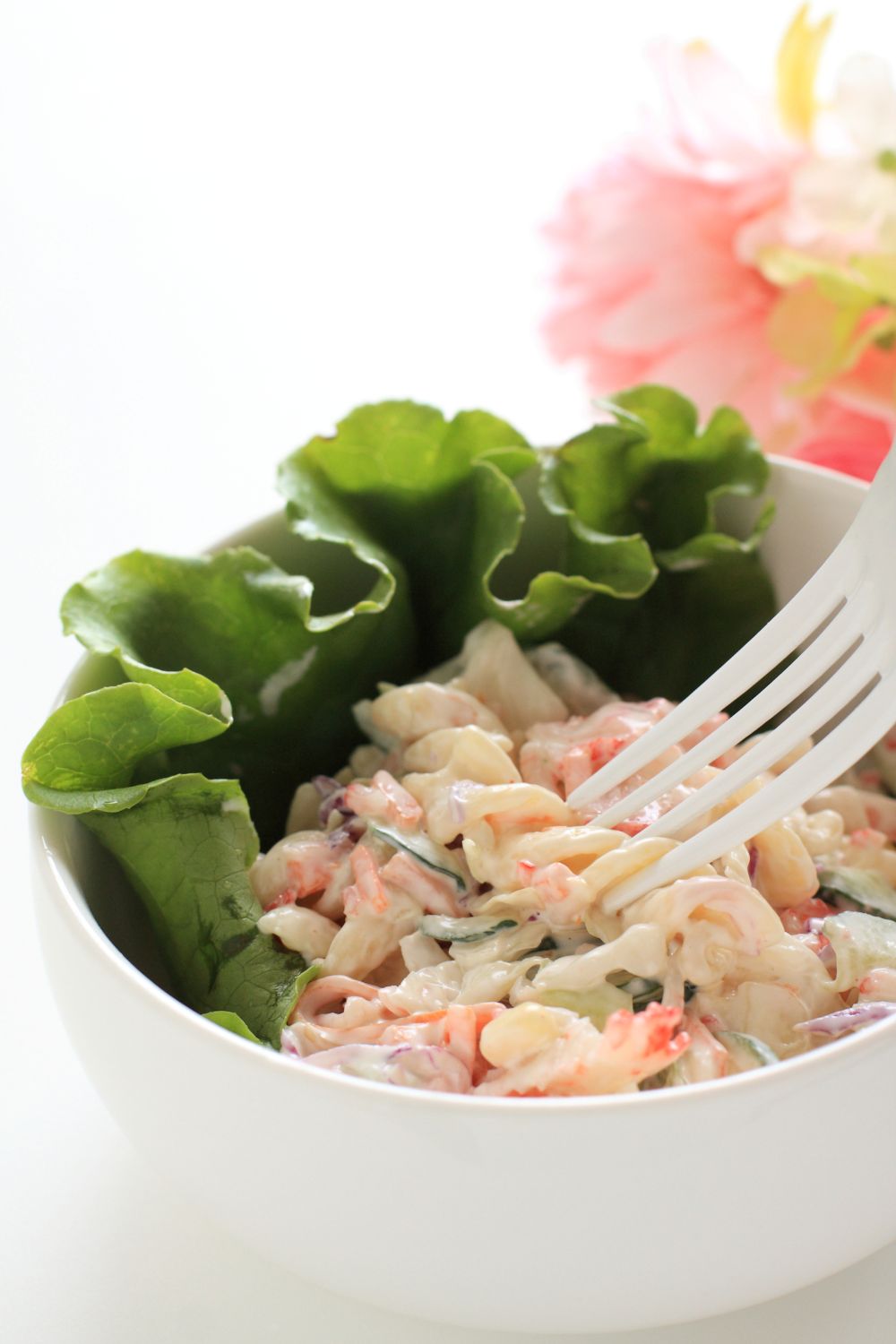 close up of creamy crab salad using spiral pasta