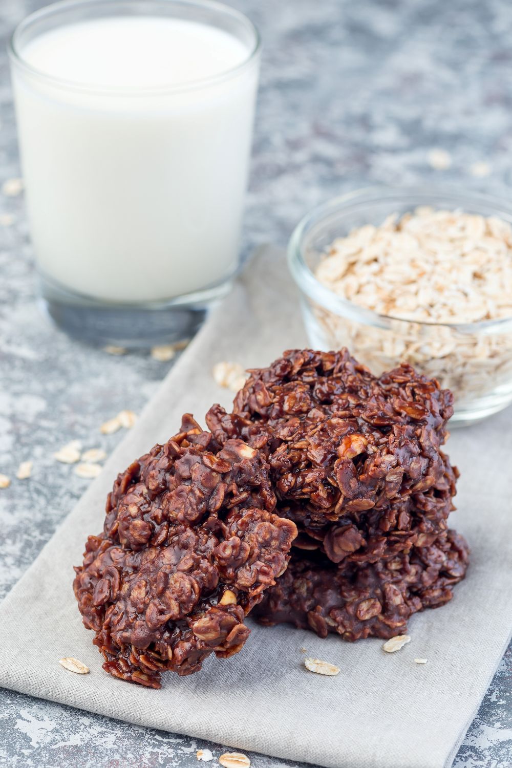 no bake chocolate peanut butter cookies with a glass of milk